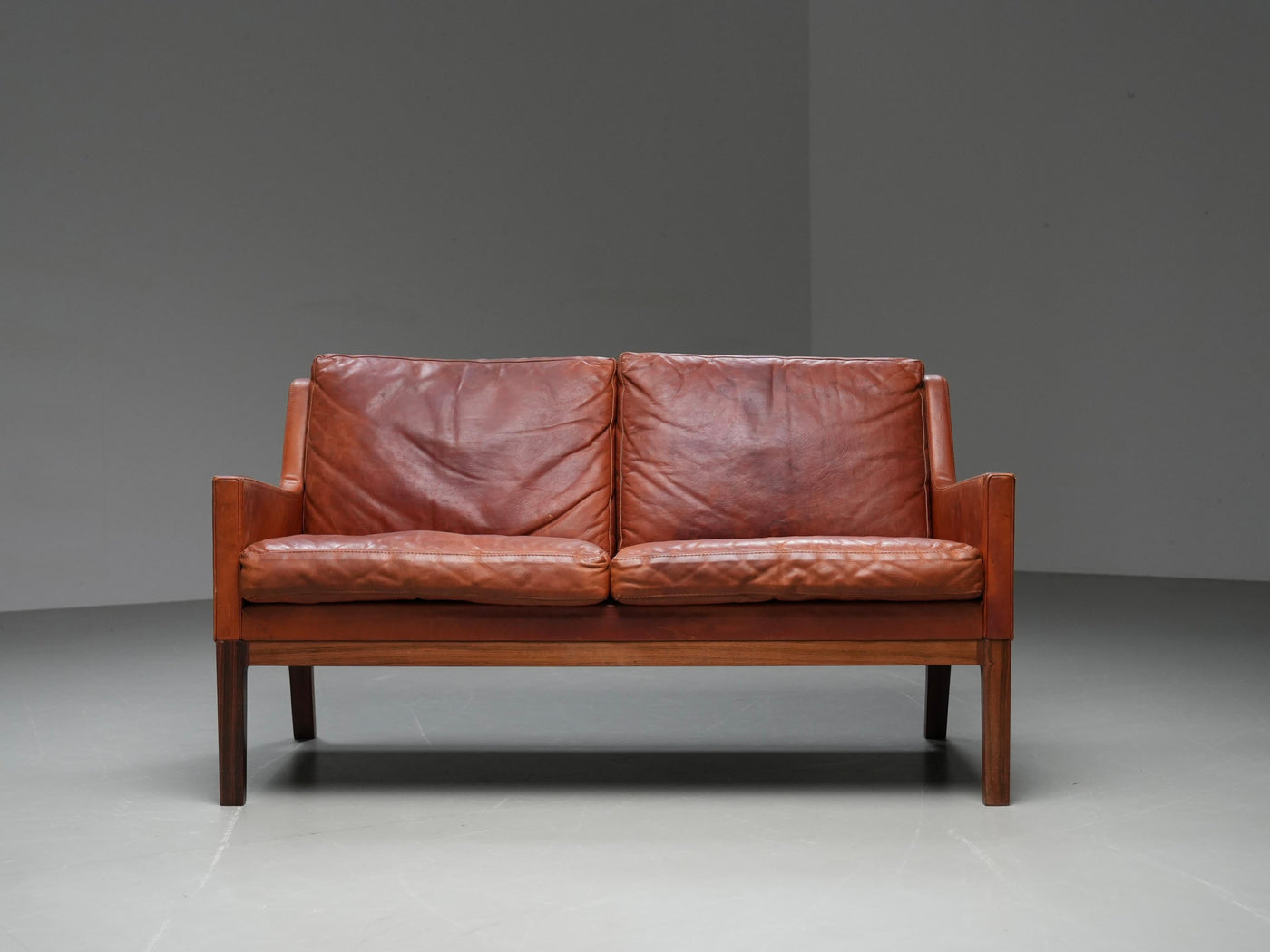 Kai Lyngfeldt Larsen 2 seat Sofa in cognac patinated Leather, Denmark, 1960’s