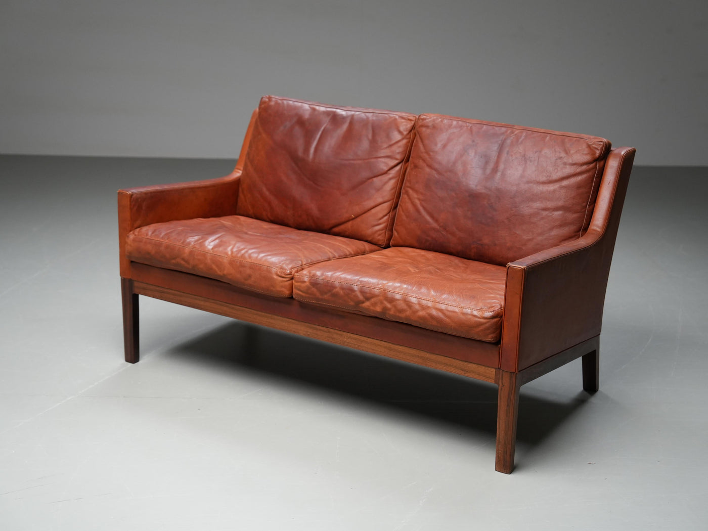 Kai Lyngfeldt Larsen 2 seat Sofa in cognac patinated Leather, Denmark, 1960’s
