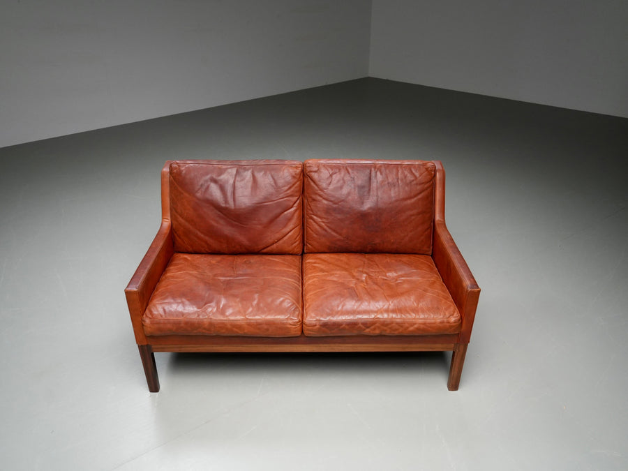 Kai Lyngfeldt Larsen 2 seat Sofa in cognac patinated Leather, Denmark, 1960’s