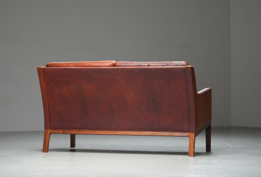 Kai Lyngfeldt Larsen 2 seat Sofa in cognac patinated Leather, Denmark, 1960’s